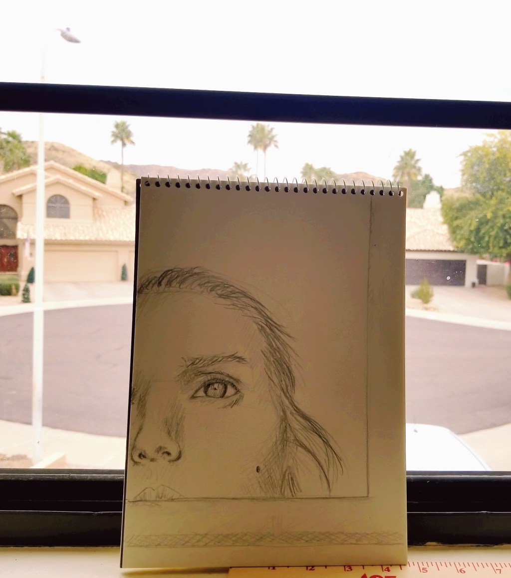 Artist staring out&nbsp;window